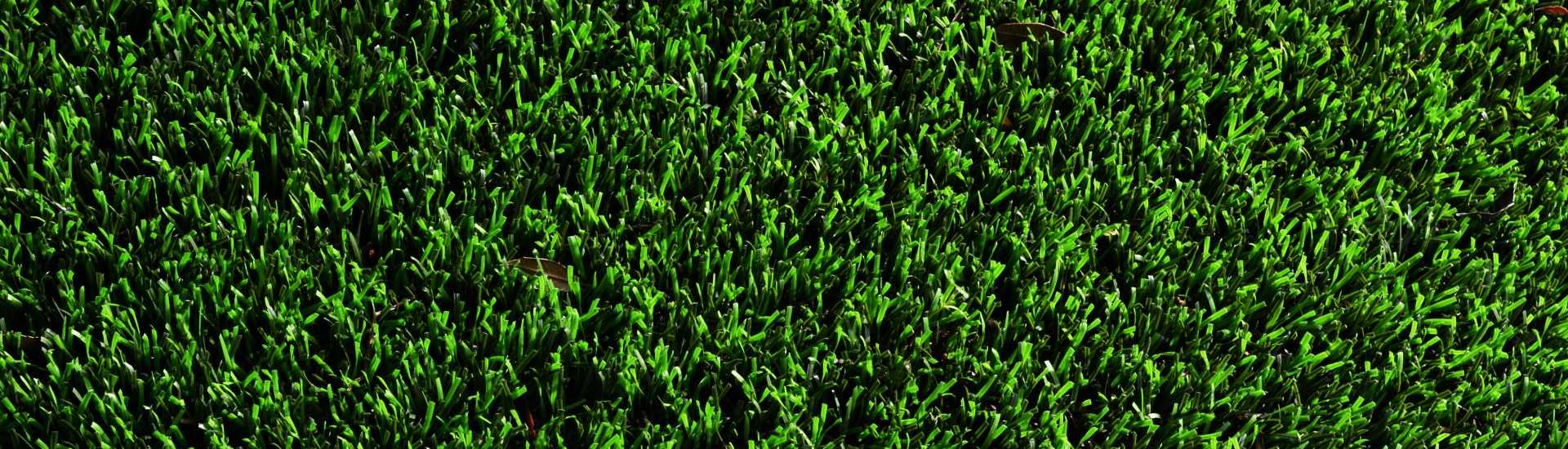 Artificial grass by Southwest Greens featuring dense, realistic green turf designed for durable, low-maintenance landscaping and year-round curb appeal.